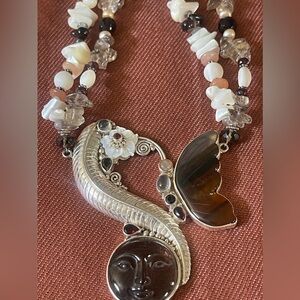 GODDESS NECKLACE
SIGNED SAJEN STERLING SILVER MOONSTONE GARNET MOP AGATE
VINTAGE